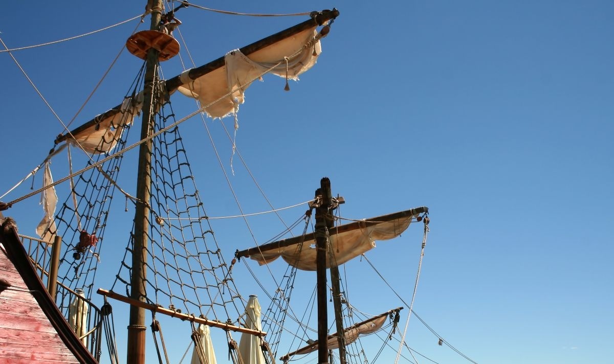 Tall Masts and Rigging of a Pirates Ship during Pirates Landing in Grand Cayman Against a Clear Sky